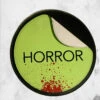 Shapeshifter - Dead Media Club (Faceplate) -Mortem Horror Shop horror sticker faceplate purse