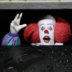 NECA IT - Pennywise (1990) Ultimate Figure -Mortem Horror Shop neca pennywise figure